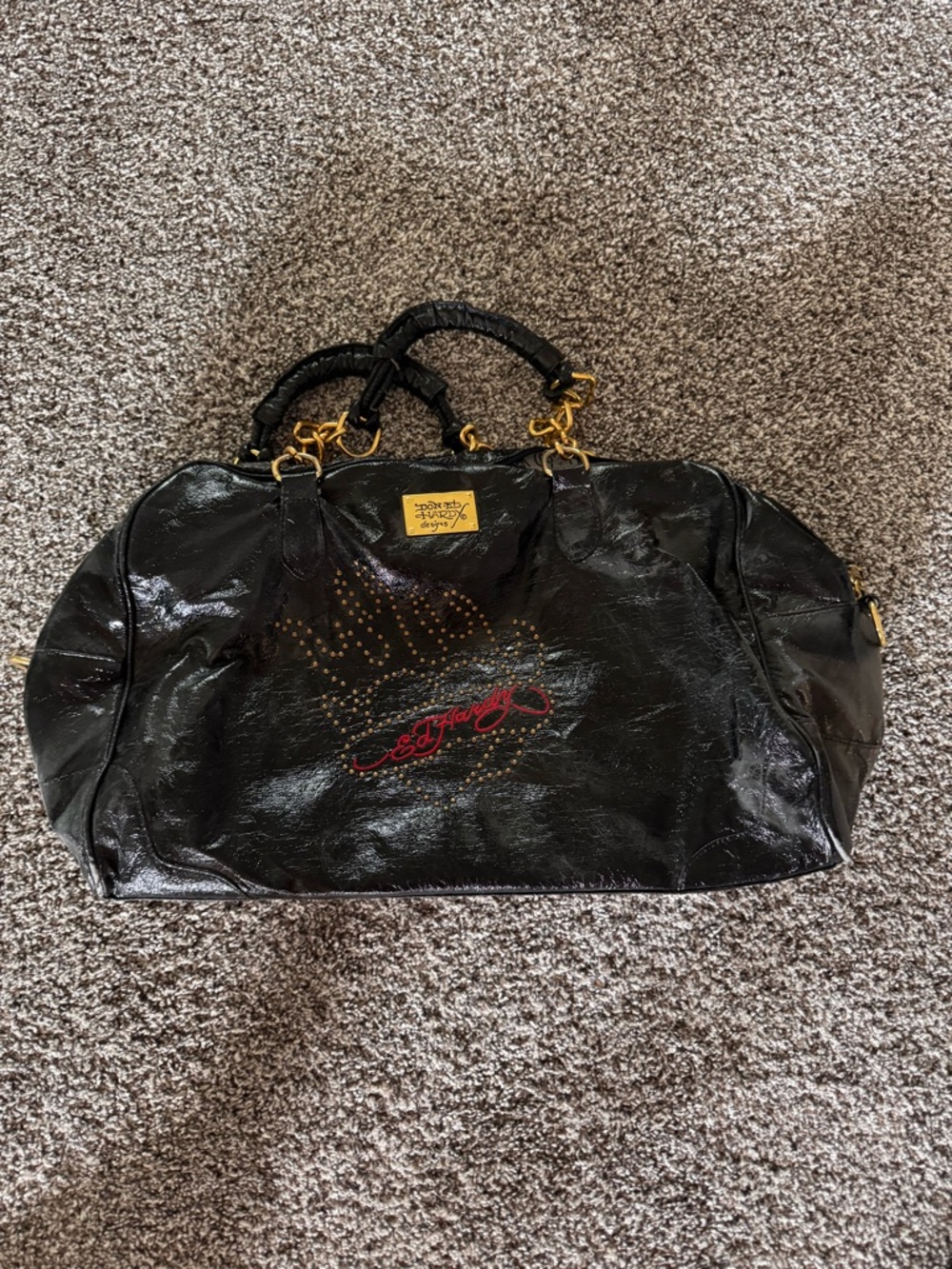 Ed Hardy Black Patent Travel Bag with Red Logo and Gold Hardware